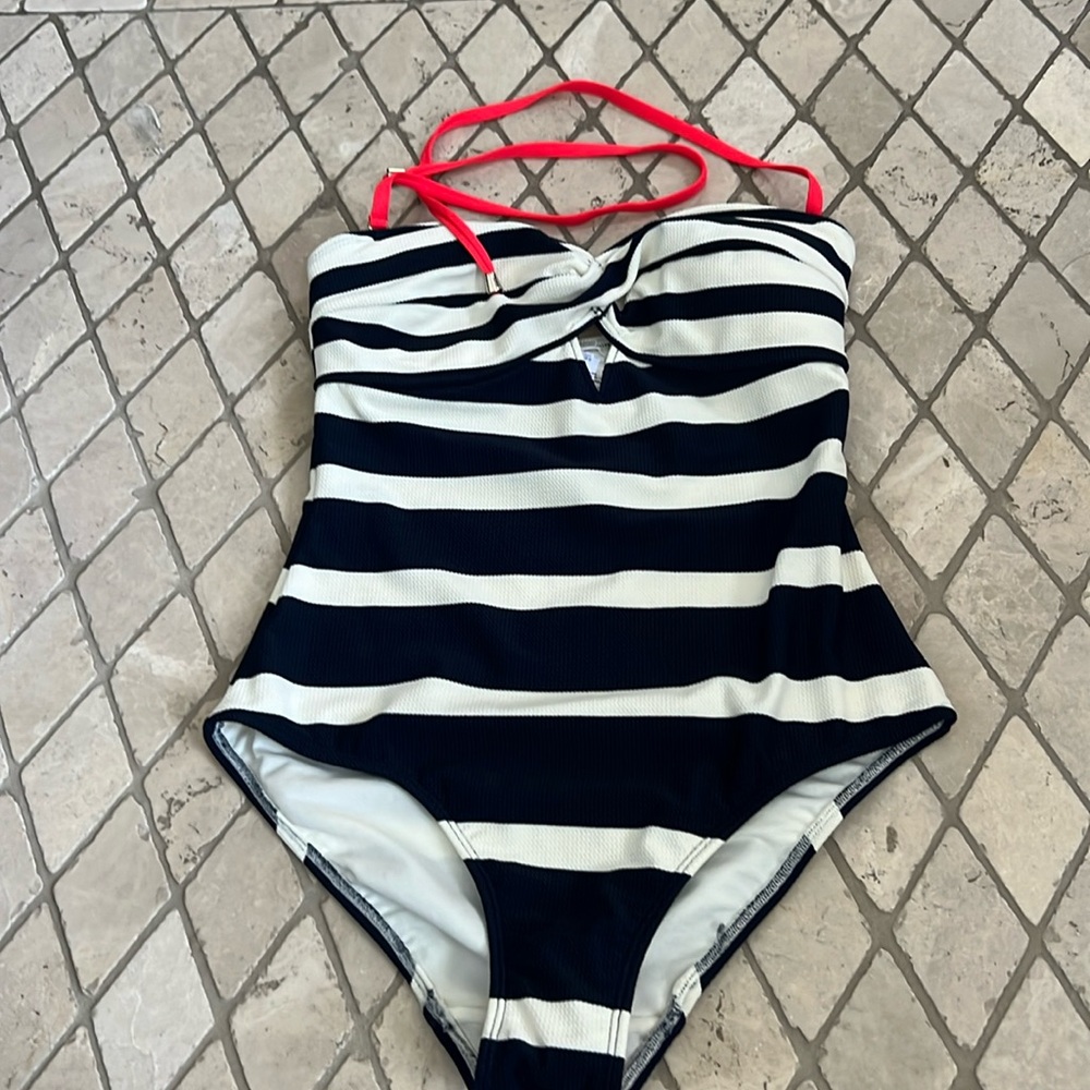 Brand new Ted Baker one piece swimsuit brand new with tag and safety tag.